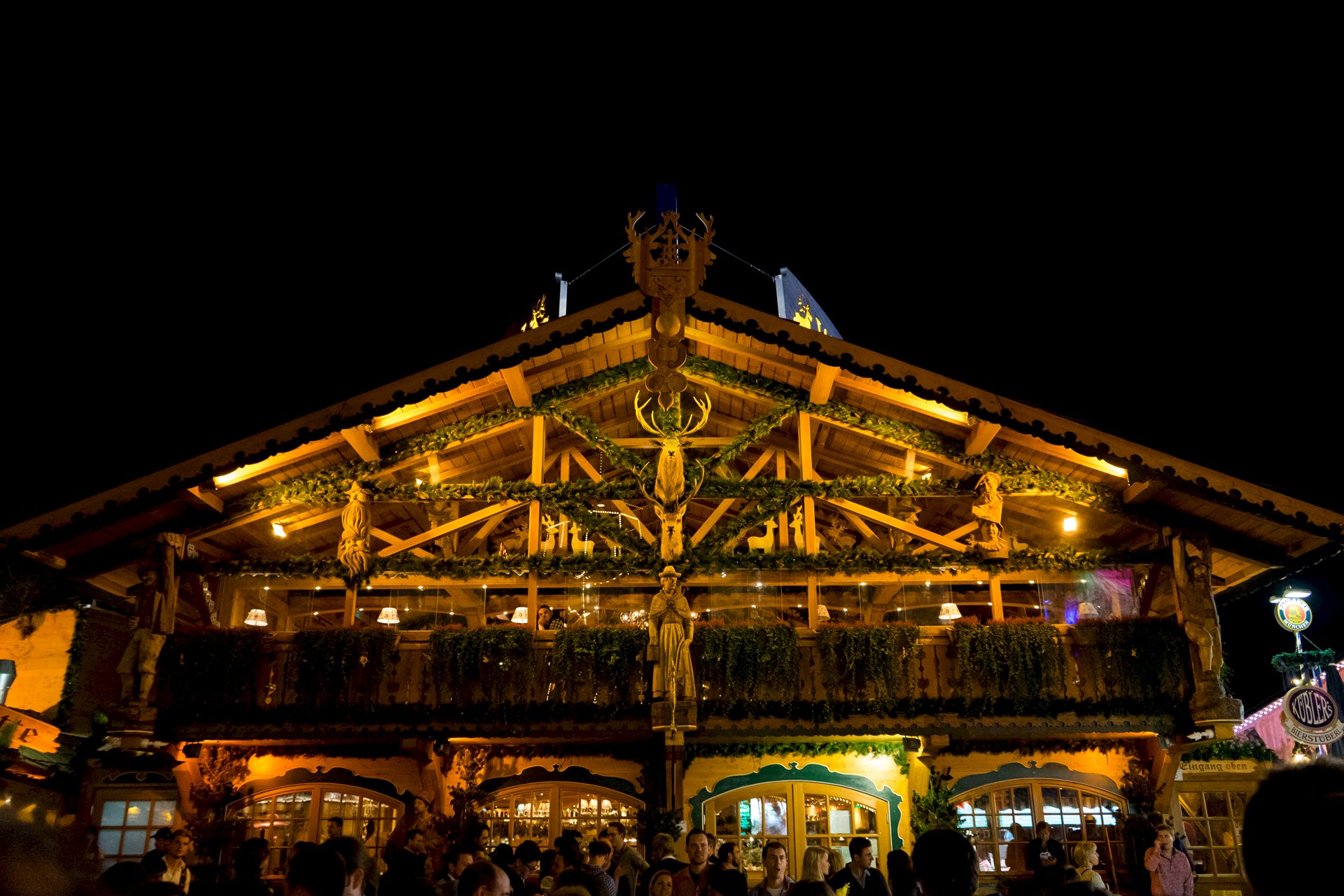 Wildstuben tent facade at night during Oktoberfest